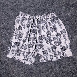 Mens paisley print shorts.